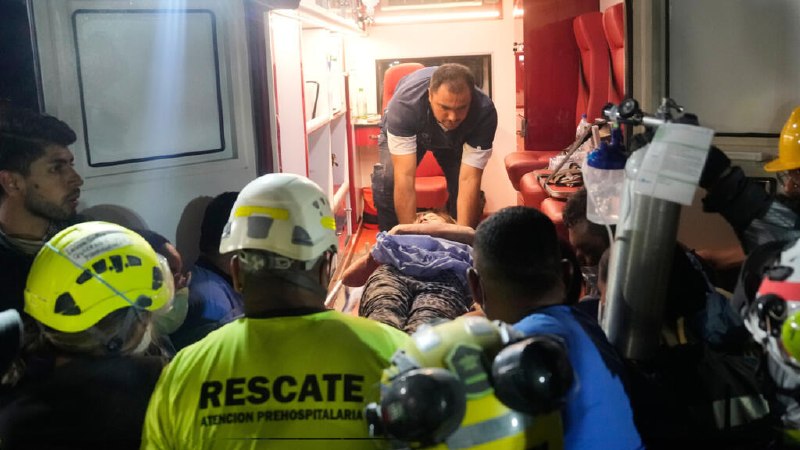 Rescue crews work through debris in Colombia after a magnitude 7.4 earthquake, the country's strongest this century.