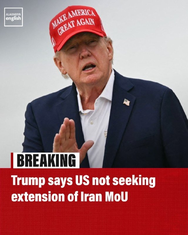 A man in a red "Make America Great Again" cap and navy blazer gestures with his hand, featured on an Al Arabiya English news graphic headlined "Trump says US not seeking extension of Iran MoU."