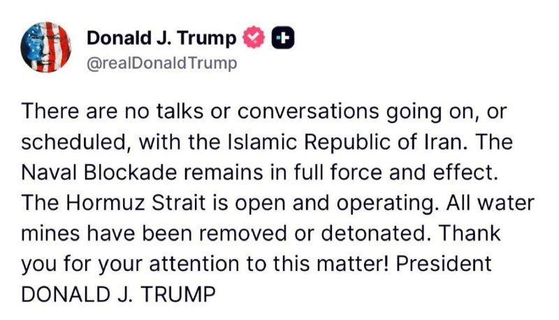 A screenshot of a Truth Social post by Donald J. Trump (@realDonaldTrump) stating there are no talks with Iran, the Naval Blockade remains in force, and the Hormuz Strait is open.