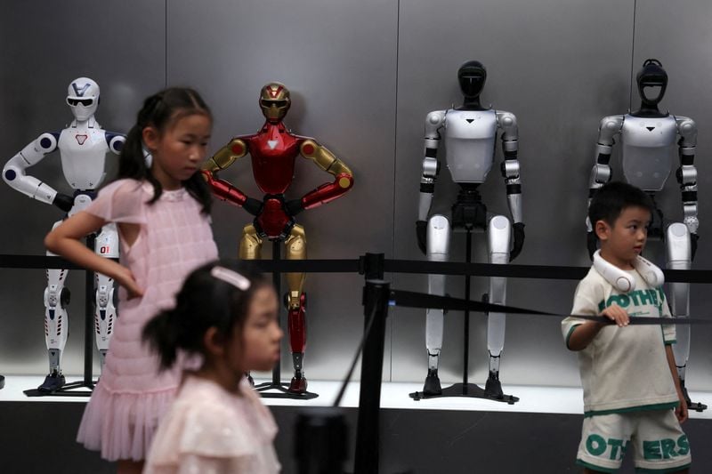Unitree signage on the Shanghai Stock Exchange floor as the humanoid robot maker's first trading session closes sharply higher.