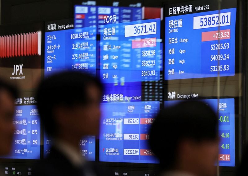 Trading screens in Singapore, where regional equities closed a downbeat week on 21 August 2026.