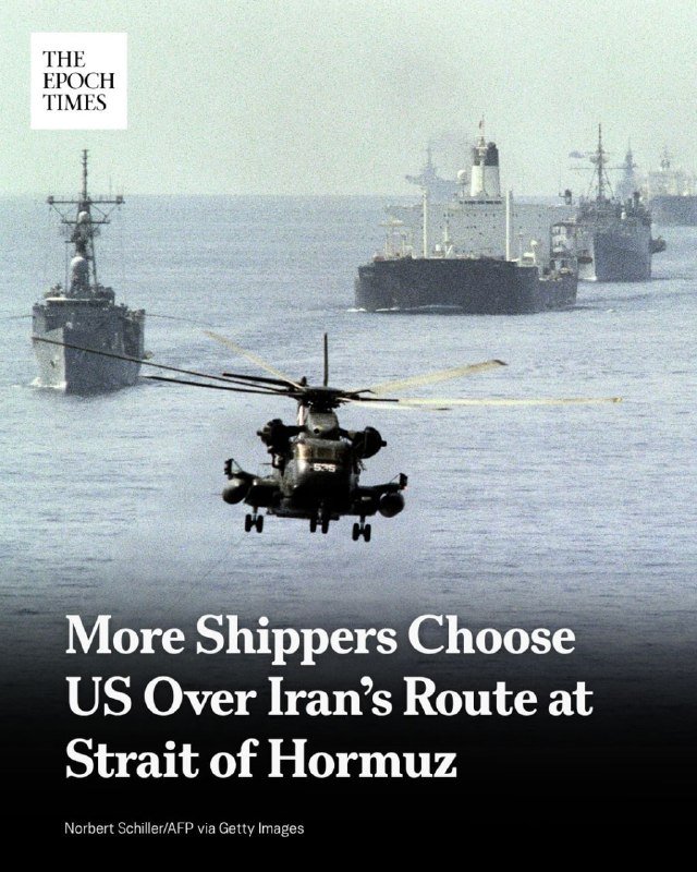 A military helicopter flies over open water with several naval ships visible in the background, overlaid with "The Epoch Times" logo and text reading "More Shippers Choose US Over Iran's Route at Strait of Hormuz."