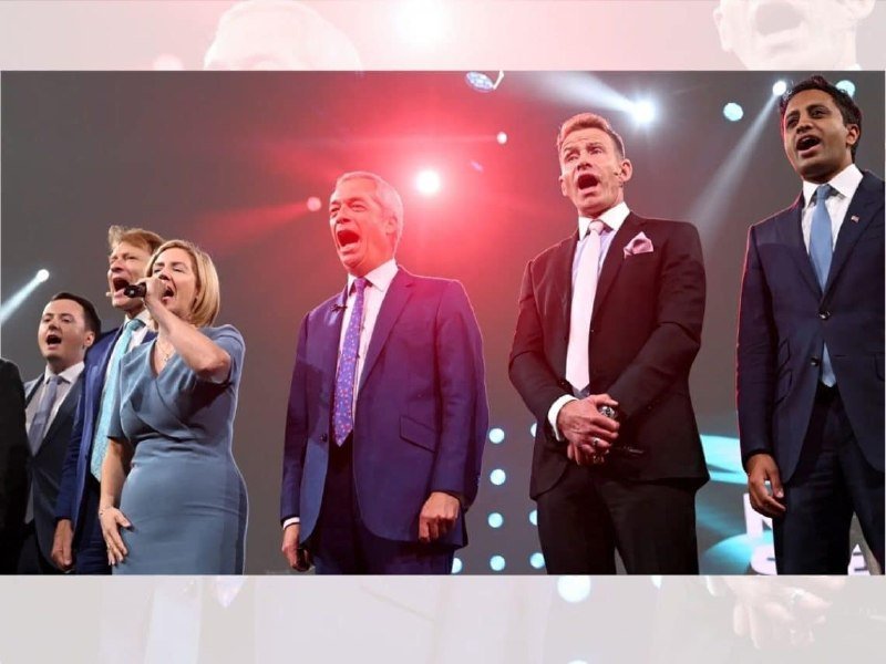A group of six formally dressed individuals sing on a stage, with a woman holding a microphone, under bright red and white stage lighting.