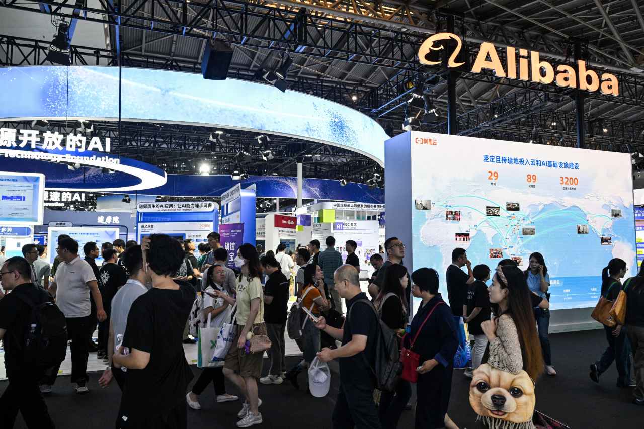 Alibaba signage outside the company's Hong Kong listing venue, where shares fell sharply on news of a $10.2bn placement to fund AI investment.