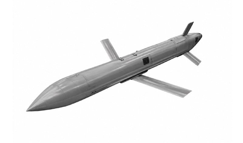 A gray illustration or 3D rendering of a missile with four fins and a pointed nose, displayed against a white background.