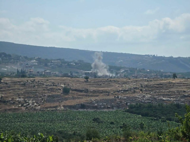 Frame from PressTV footage filed 28 August 2026, showing the outskirts of Aita al-Jabal in southern Lebanon after reported Israeli incendiary action.
