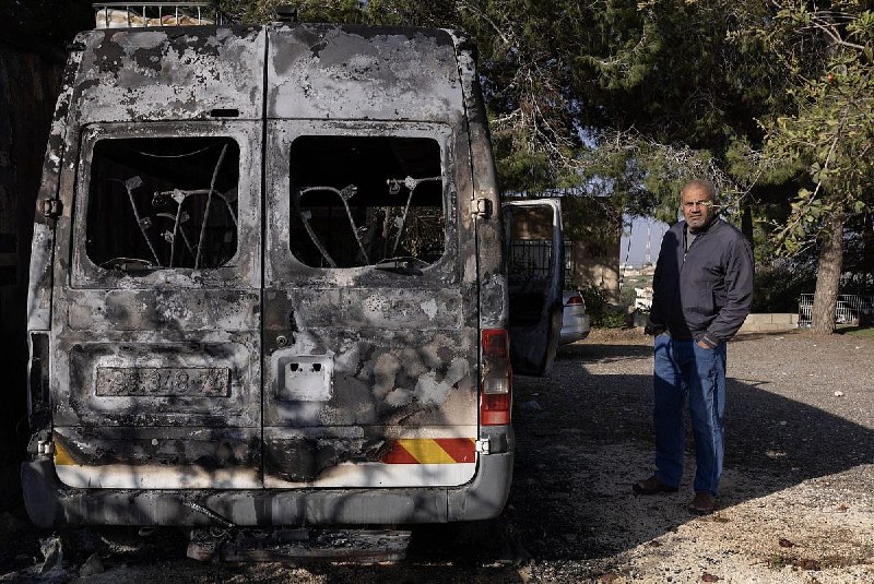 Smoke rising from a settler's arson attack on Palestinian farmland in the occupied West Bank, August 2026.
