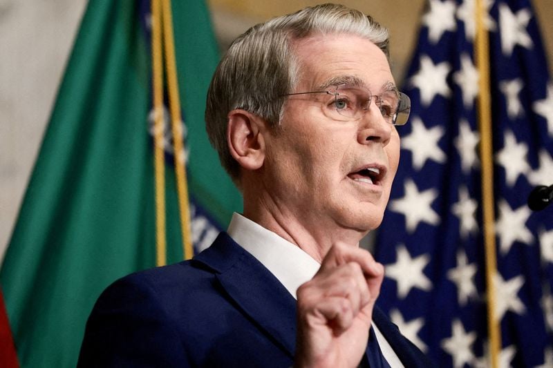 U.S. Treasury Secretary Scott Bessent at a podium during a press briefing.