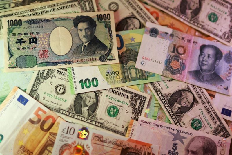 Trading screens in Tokyo as the 10-year JGB yield clears a multi-decade threshold.