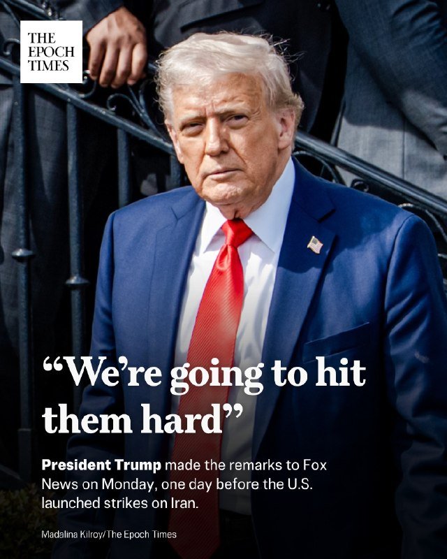 A man in a blue suit and red tie stands before a black iron railing, with a quote graphic overlaid reading "We're going to hit them hard."