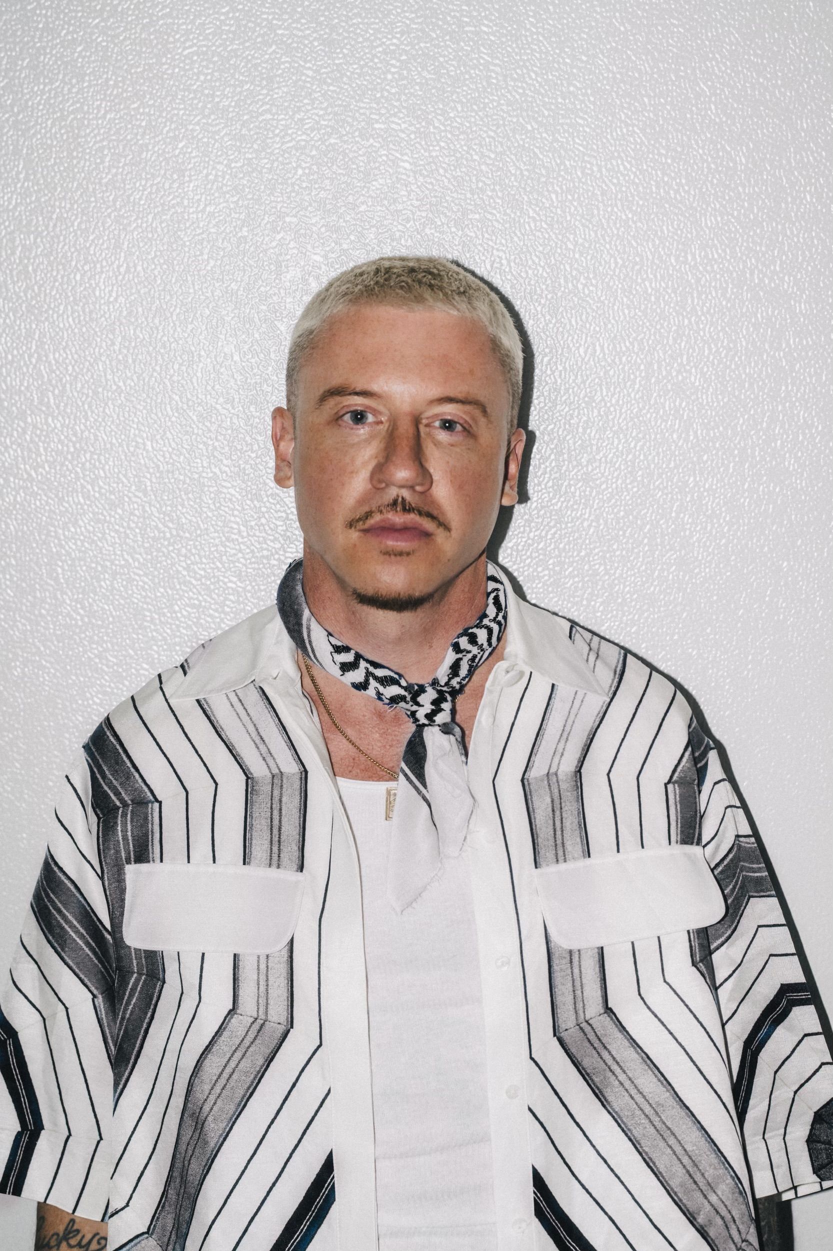 Macklemore performing in 2026, the year he announced a three-city European tour in support of Palestinian charities.