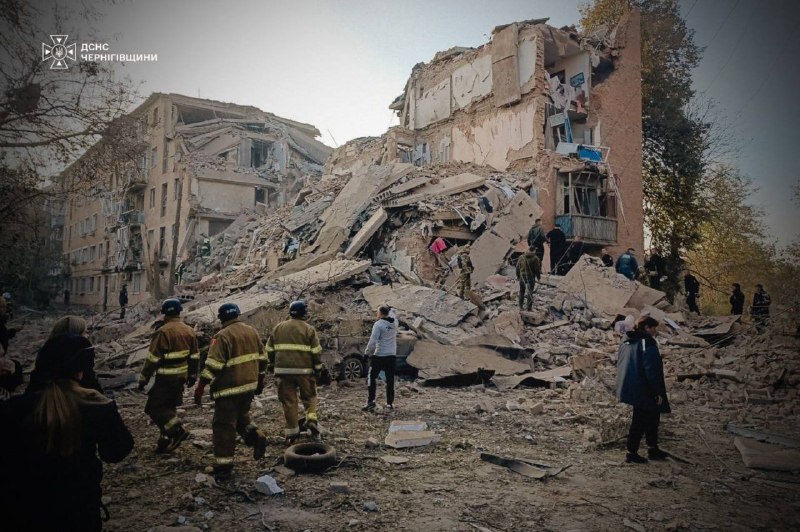 Rescue crews work through the rubble of a five-storey residential building in Pryluky, Chernihiv Oblast, after a cruise missile strike in the early hours of 7 October 2026.