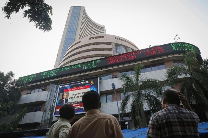 Trading screens on 7 October 2026 after the Reserve Bank of India raised its policy rate for the first time in nearly four years, dragging the Nifty 50 down 0.76% at the close.
