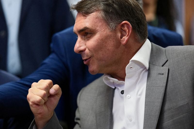 File image of Senator Flavio Bolsonaro at a public event in Brasília, distributed via a Telegram wire relay.