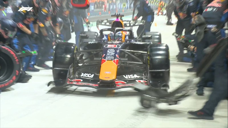 Verstappen leads the field through the Marina Bay street circuit during the 2026 Singapore Grand Prix weekend.