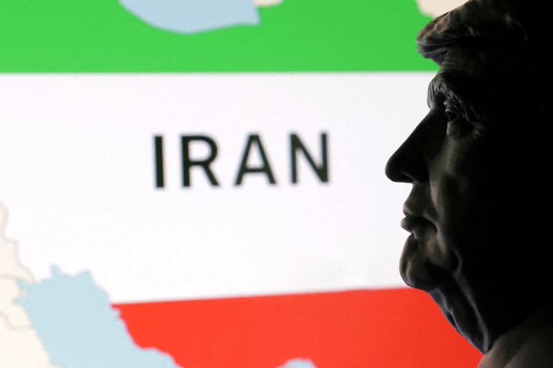 File image: an oil refinery at dusk, used by Investing.com to illustrate its 16 October 2026 economy-news report on potential US action against Iran.